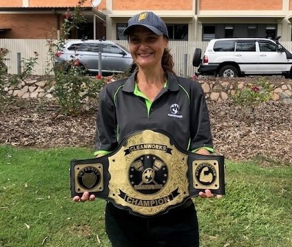 Rose holding Cleanworks award